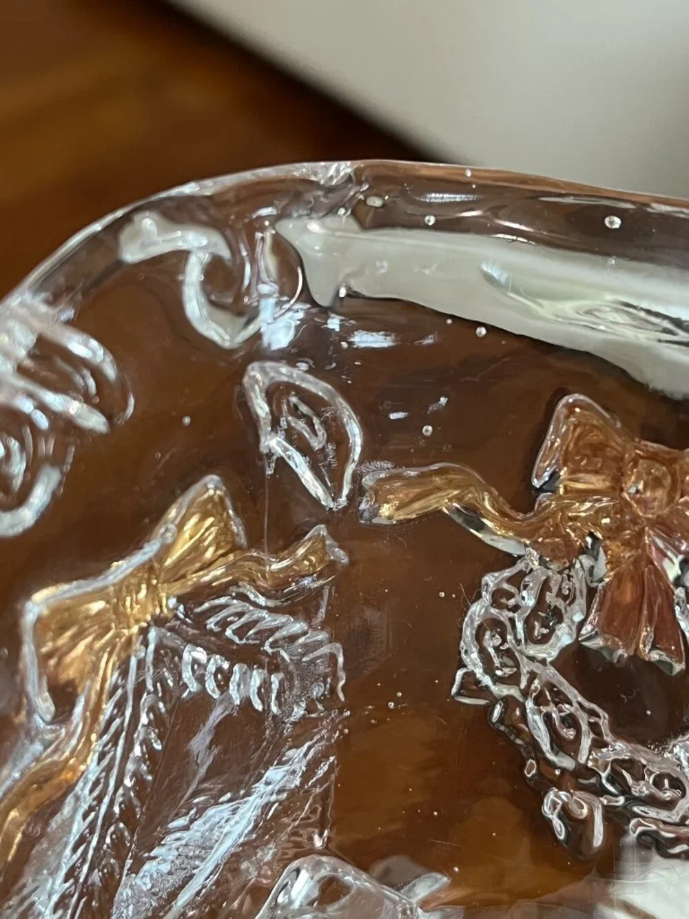 Glass sleigh with decorative gold-painted bows | Vintage
